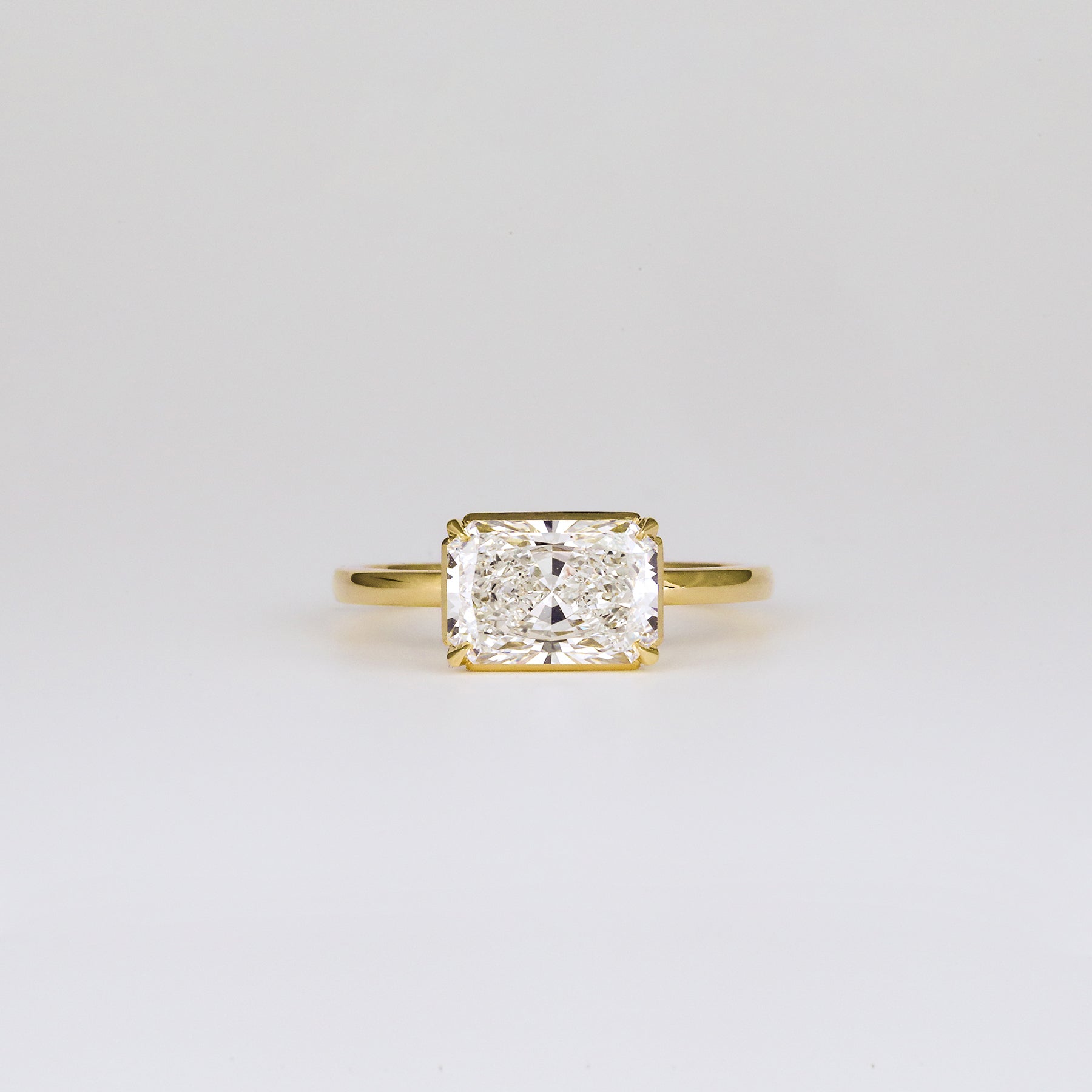 Aaren East-West Radiant Cut 2.01ct Lab Grown Diamond Solitaire Ring in Yellow Gold