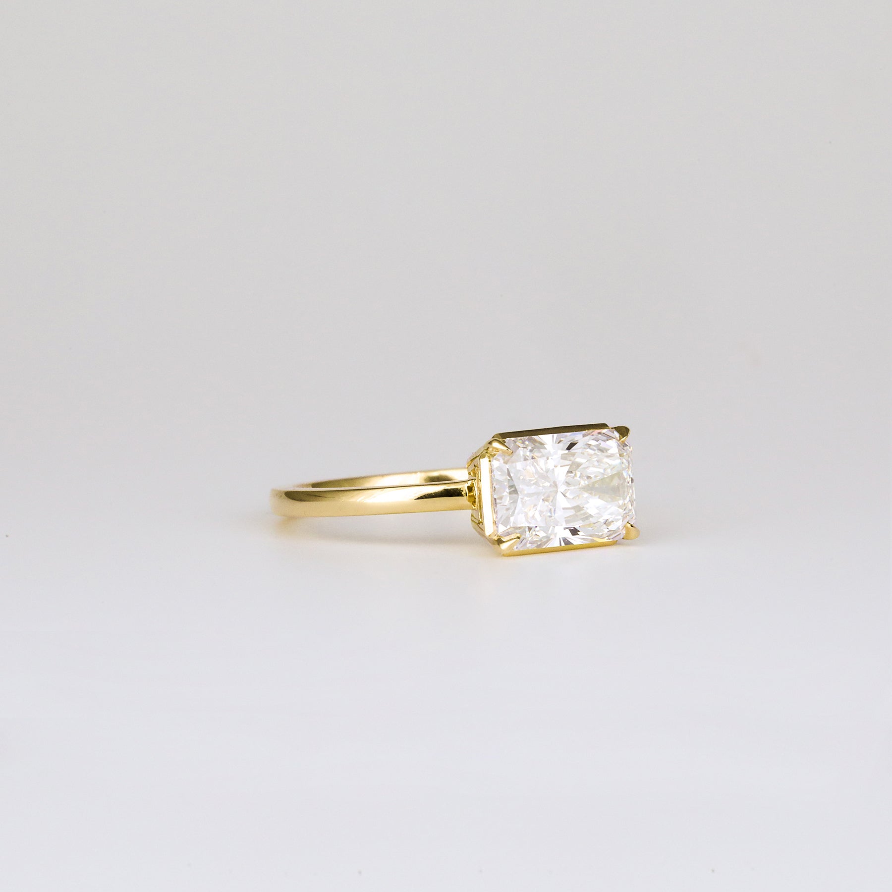 Aaren East-West Radiant Cut 2.01ct Lab Grown Diamond Solitaire Ring in Yellow Gold