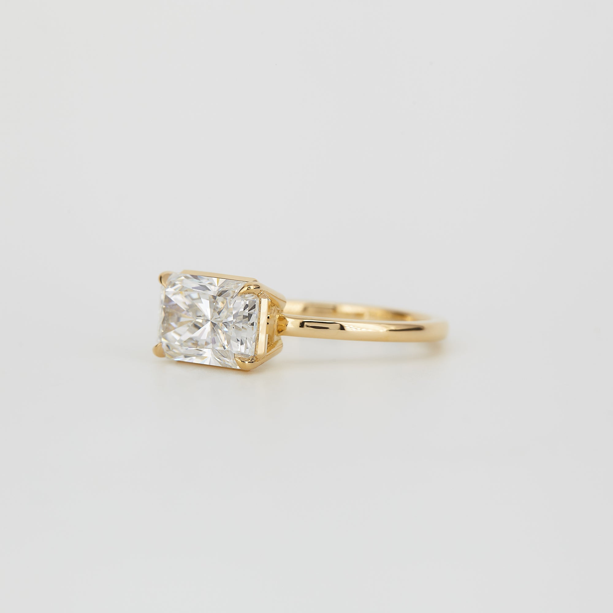 Aaren East-West Radiant Cut 2.38ct Lab Grown Diamond Solitaire Ring in Yellow Gold