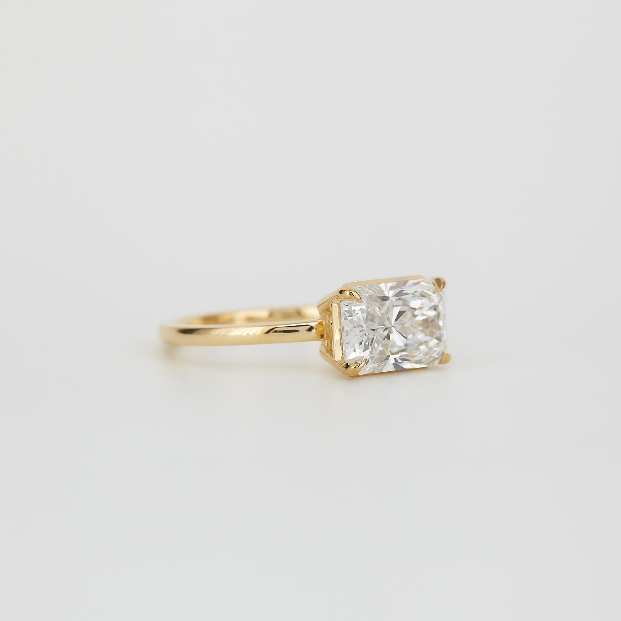 Aaren East-West Radiant Cut 2.38ct Lab Grown Diamond Solitaire Ring in Yellow Gold