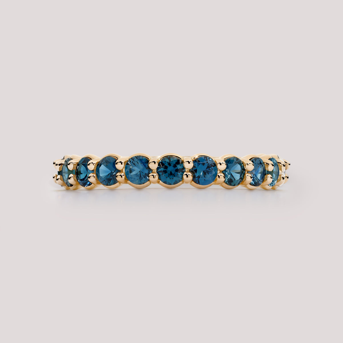 Teal Sapphire Shared Prong Band