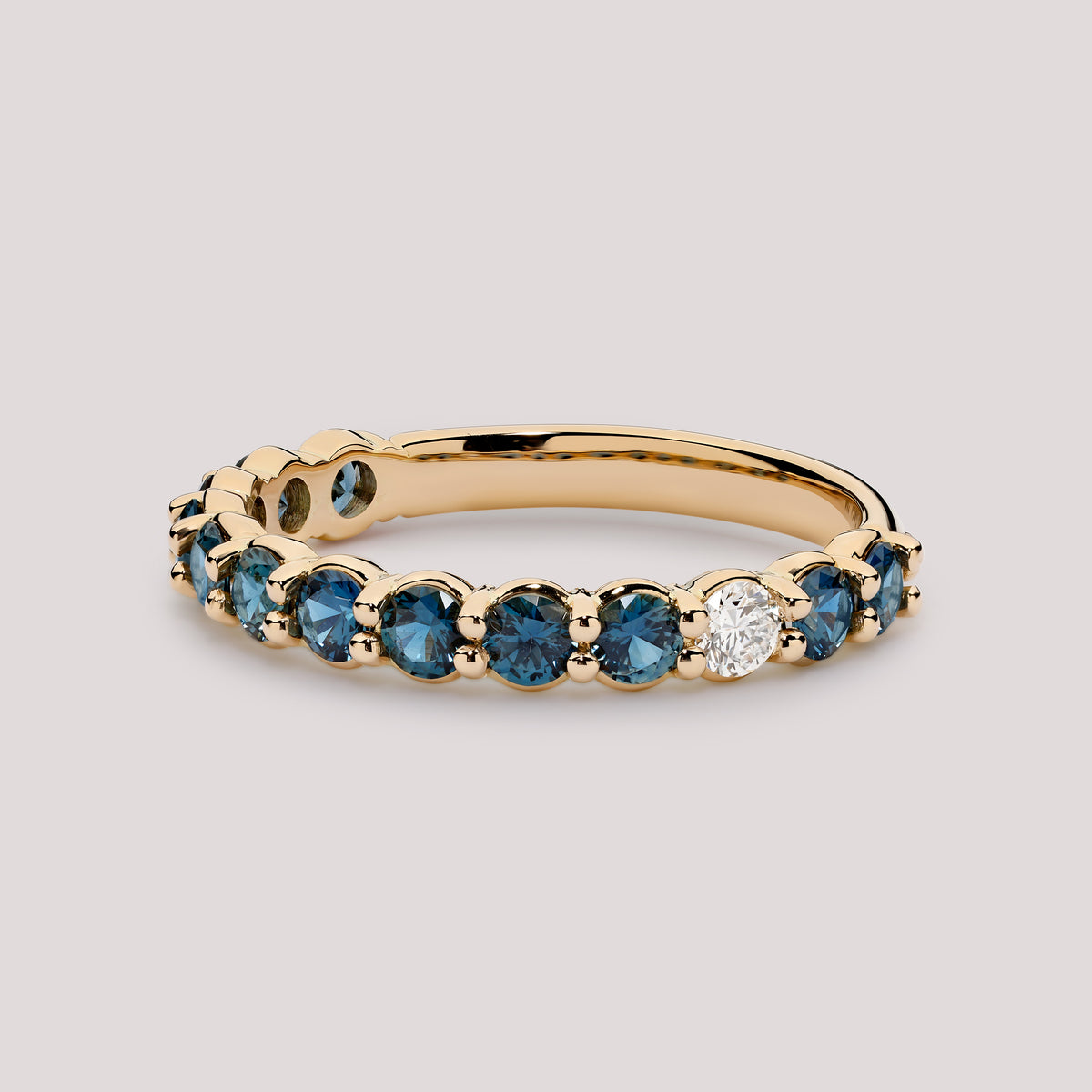 Teal Sapphire Shared Prong Band